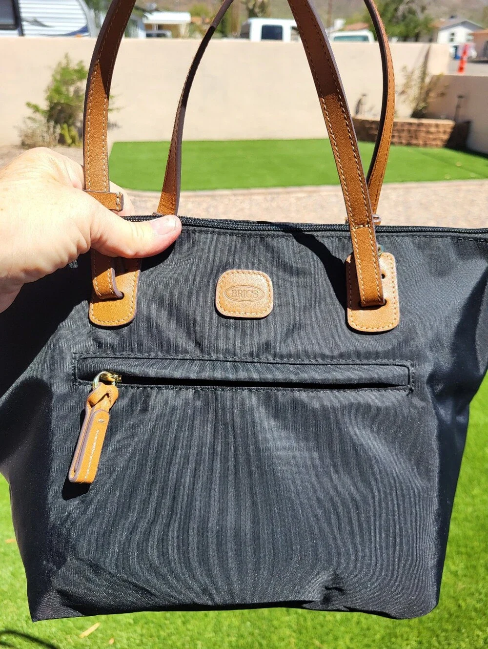 Bric's Milano Black Luxury X-collection Commuter Tote with Tan Leather Handles.
